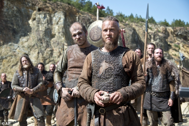 In this photo dated July, 8 2013 Ragnar, front, played by actor Travis Fimmel, a leading character from television show Vikings, Historys brooding and brutal drama about the 8th-century Nordic warrior Ragnar Lothbrok. After a six-month shoot in Ireland, season two debuts Thursday night sporting a bigger scale, more confident pace and stronger entertainment than last years uneven, at-times plodding inaugural run.(AP Photo/Bernard Walsh/History)